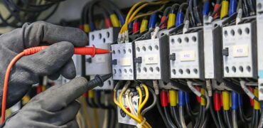 Electrician-With-Gloves-Testing